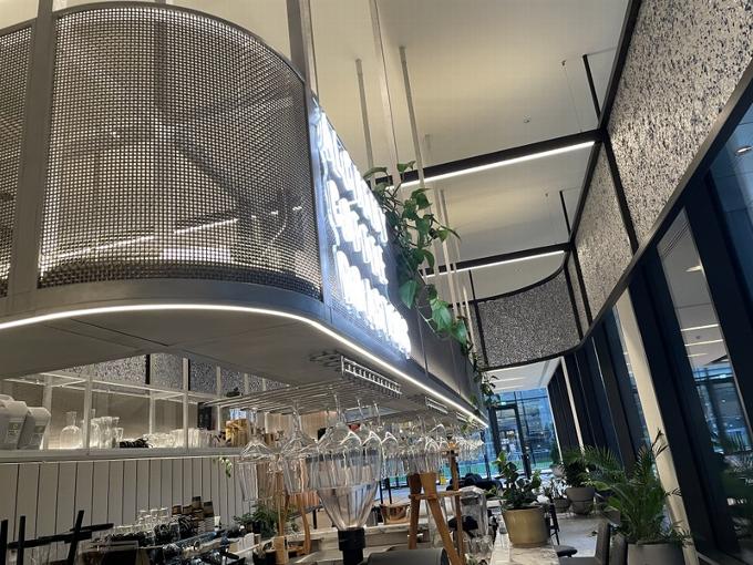 Engineered metalwork coving in restaurant with lighting 